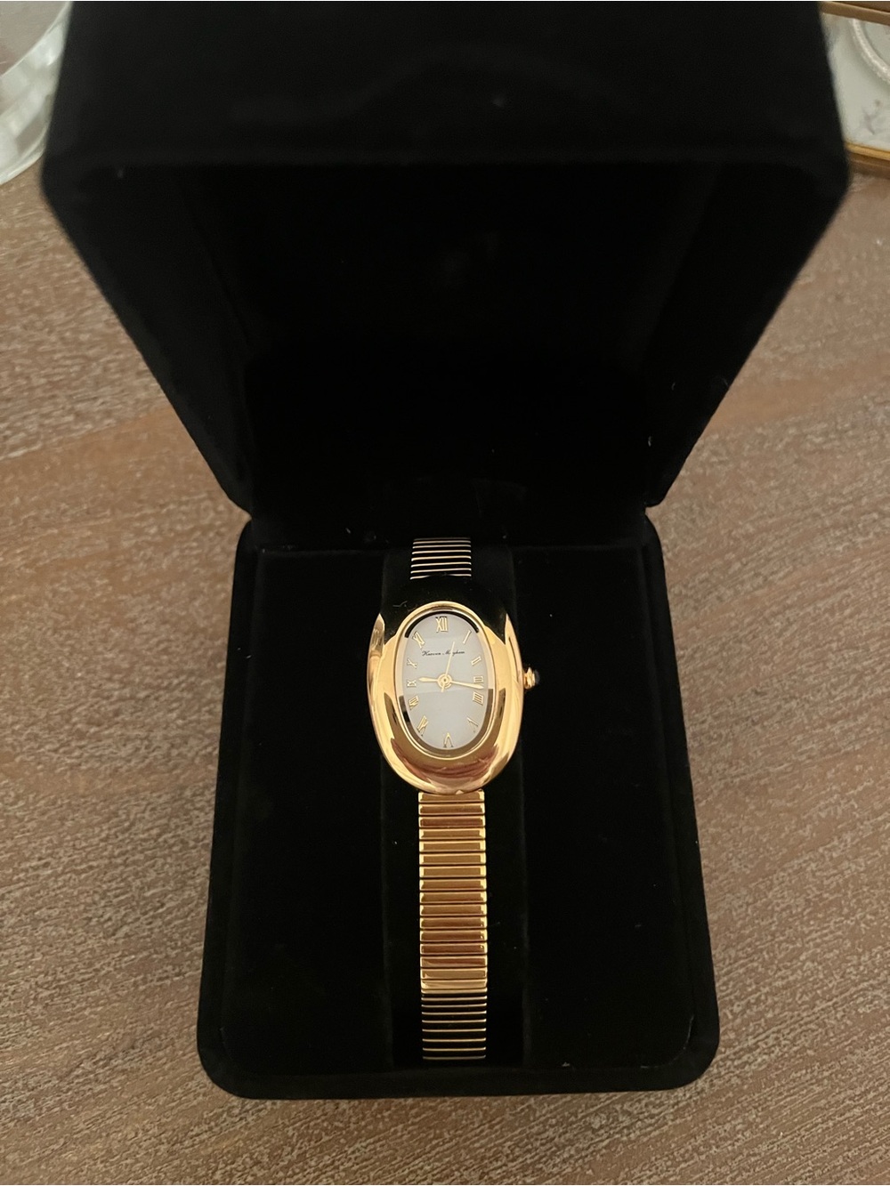 Elegant Gold-Tone Oval Women’s Watch with White Dial
